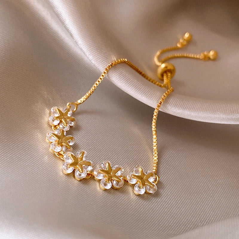 Exquisite Rhinestone Star & Flower Charm Bracelet – Adjustable Gold Color Bangle for Women