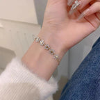 Exquisite Rhinestone Star & Flower Charm Bracelet – Adjustable Gold Color Bangle for Women